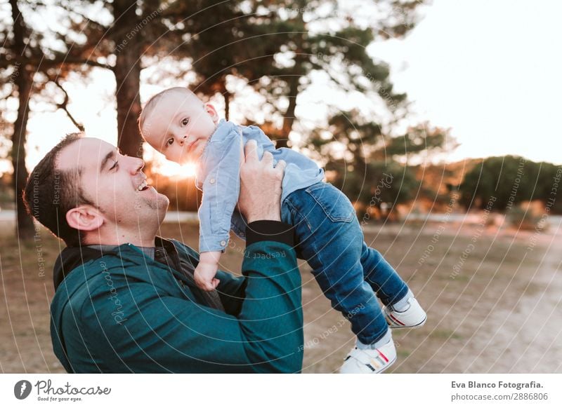 young dad and son playing outdoors at sunset. family concept Lifestyle Joy Beautiful Freedom Success Child Human being Masculine Baby Boy (child) Young man