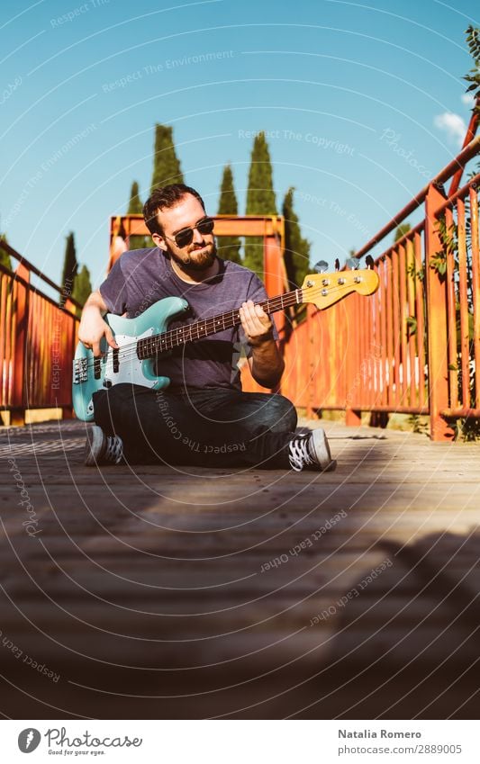 outdoor photo session with a bass player and his instruments Playing Entertainment Music Human being Man Adults Concert Band Musician Guitar Nature Rock Black