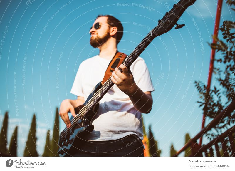 outdoor photo session with a bass player and his instruments Playing Entertainment Music Human being Man Adults Concert Band Musician Guitar Nature Rock Black