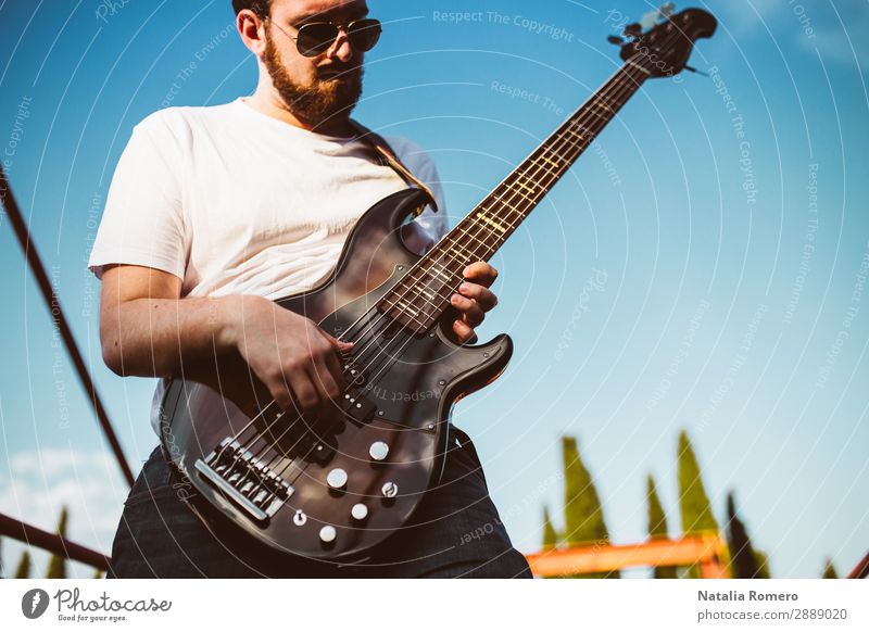 outdoor photo session with a bass player and his instruments Playing Entertainment Music Human being Man Adults Concert Band Musician Guitar Nature Rock Black