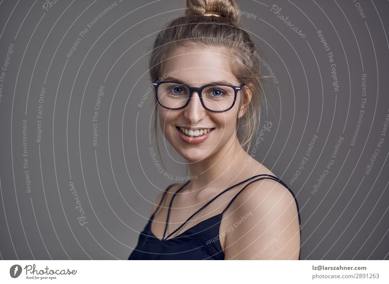 Attractive blond woman wearing glasses Roll Lifestyle Style Joy Happy Beautiful Face Business Woman Adults 1 Human being 18 - 30 years Youth (Young adults)
