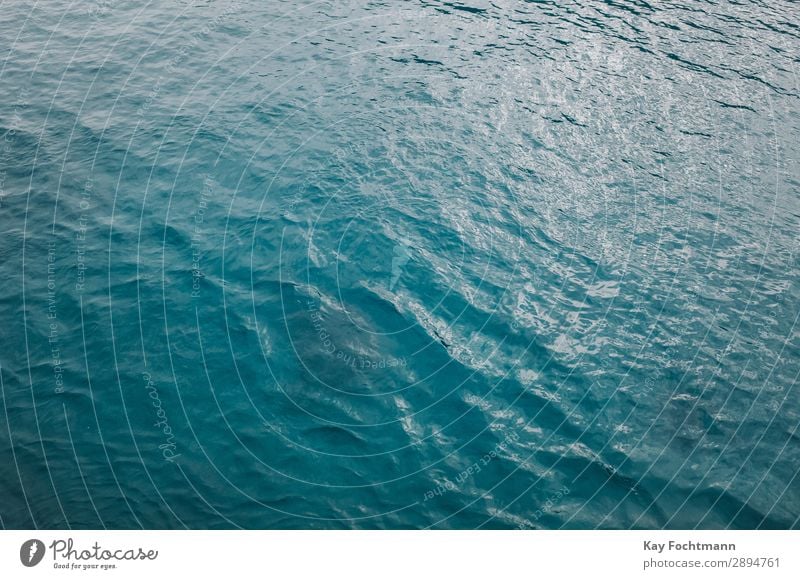 https://www.photocase.com/photos/2894761-blue-ocean-surface-clear-water-pattern-wave-summer-photocase-stock-photo-large.jpeg