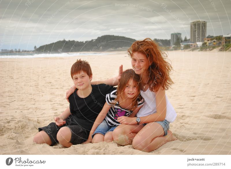 to be glad it needs little Brothers and sisters 3 Group of children 3 - 8 years Infancy 8 - 13 years Clouds Pacific beach Gold Coast Queensland Sand Smiling Sit