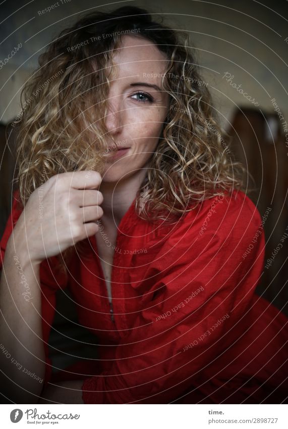 Woman with curly hair in a red dress Feminine Adults 1 Human being Ruin lost places Dress Blonde Long-haired Curl Observe To hold on Smiling Looking