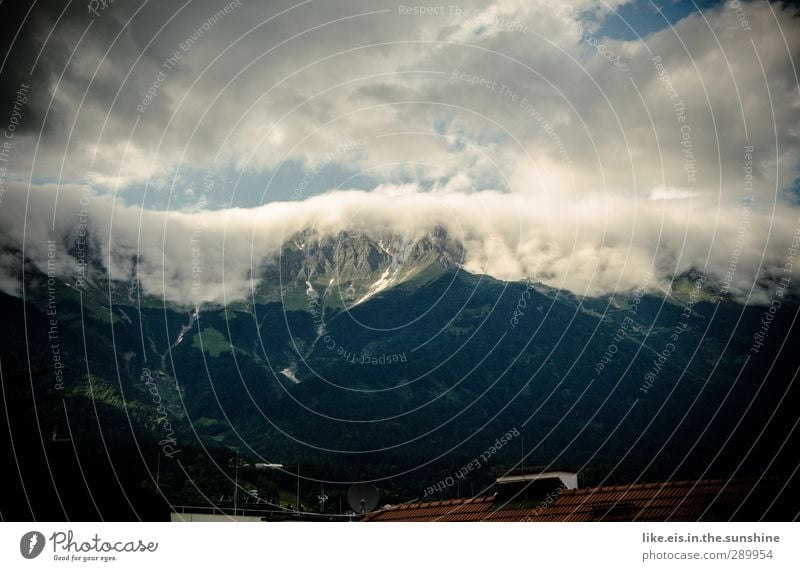 cloud waterfalls over innsbruck Far-off places Snow Mountain Environment Nature Landscape Elements Clouds Climate Weather Alps Peak Town Roof Chimney Large