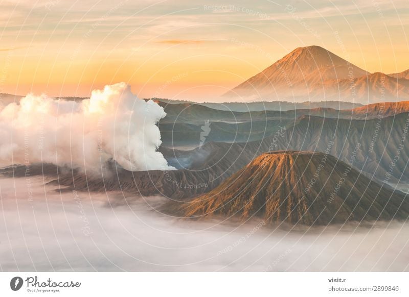 Mount Bromo volcano at sunrise, East Java, Indonesia. Vacation & Travel Tourism Adventure Freedom Mountain Hiking Environment Nature Landscape Earth Sky Clouds