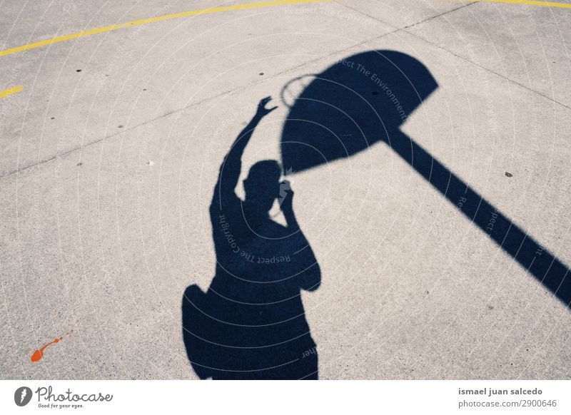 man shadow silhouette playing basket Silhouette Human being Man Playing Basket Sports Shadow Light (Natural Phenomenon) Sun Street Ground Exterior shot City