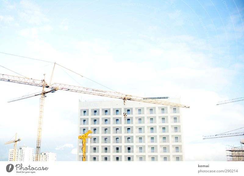 library Crane Construction site Sky Clouds Town House (Residential Structure) Manmade structures Building Architecture Library Facade Window Esthetic Bright New