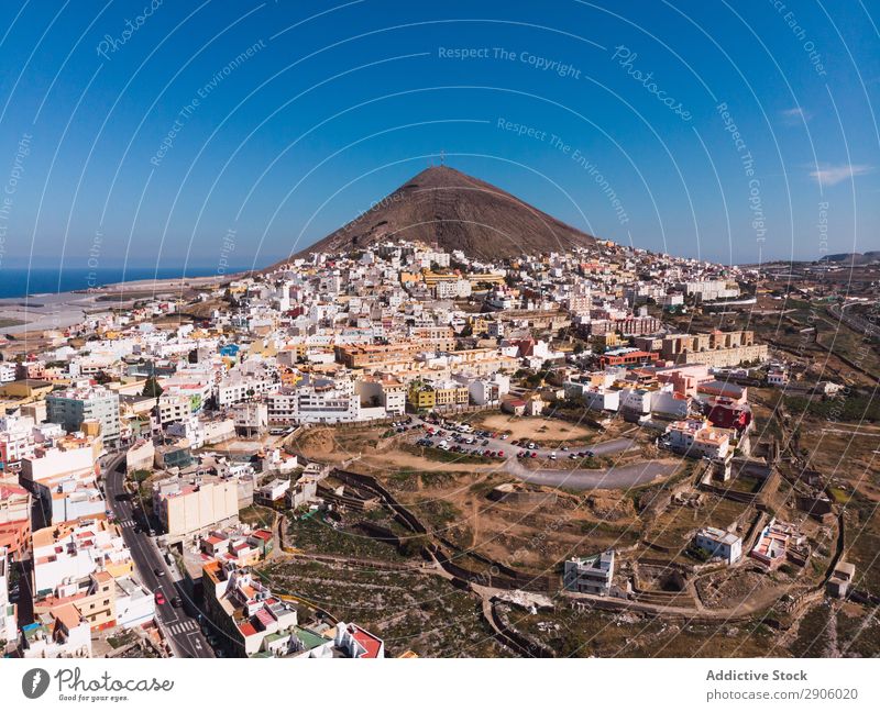 Landscape of town on coast of island Island City drone view Remote Aircraft Gran Canaria Spain Picturesque Vacation & Travel Bright Beautiful Blue sky Coast