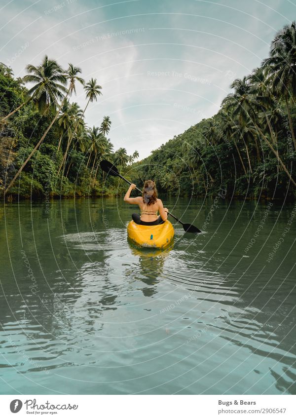 down the river Feminine Young woman Youth (Young adults) Nature Water Summer Beautiful weather Forest Virgin forest River Bikini Red-haired Curl Adventure Kayak