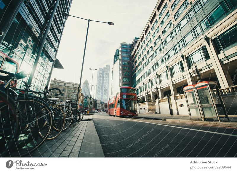 Red bus on city street Bus Street riding Modern Exterior London England Transport City Town Vacation & Travel Trip Public Station Wait Vehicle Famous building