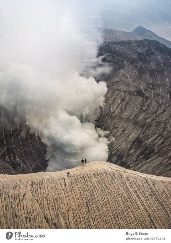 clouds of smoke Couple Partner 2 Human being Environment Nature Landscape Elements Fire Climate Mountain Peak Volcano bromo Adventure Uniqueness Discover Smoke