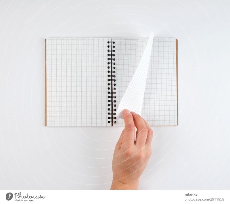 Opened notebook / sketchbook with one blank page paper and pencil - a  Royalty Free Stock Photo from Photocase