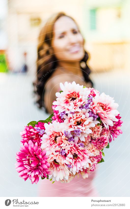 A young woman holding a bouquet of wildflowers in her hands Lifestyle Elegant Style Happy Beautiful Freedom Summer Human being Woman Adults Nature Flower