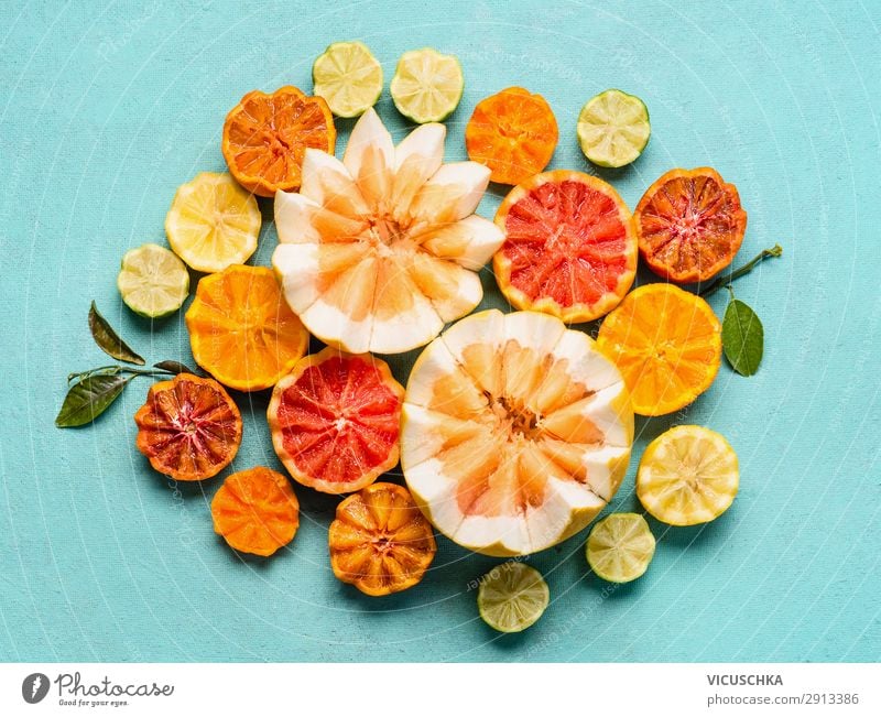 Various citrus fruits on a light blue background Food Fruit Orange Nutrition Organic produce Shopping Style Design Healthy Healthy Eating Yellow Composing