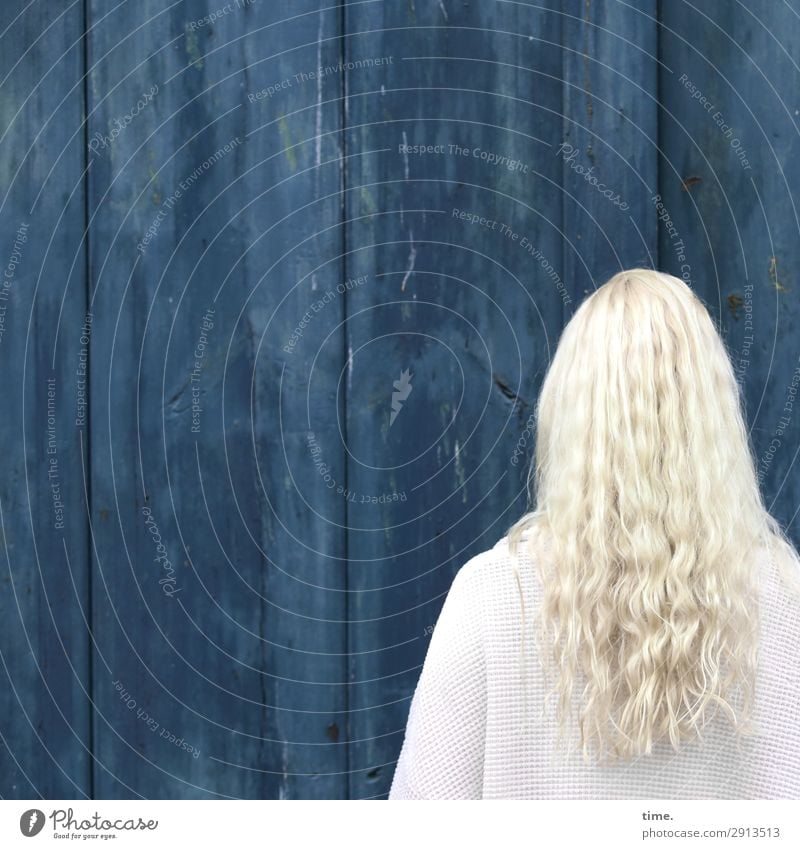 blonde woman in front of blue wooden wall Feminine Woman Adults Head Hair and hairstyles 1 Human being Wall (barrier) Wall (building) Jacket Blonde Long-haired