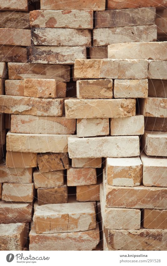 builds again on III Manmade structures Wall (barrier) Wall (building) Stone Brick Dirty Sharp-edged Stack Build Tidy up Construction site Material Colour photo