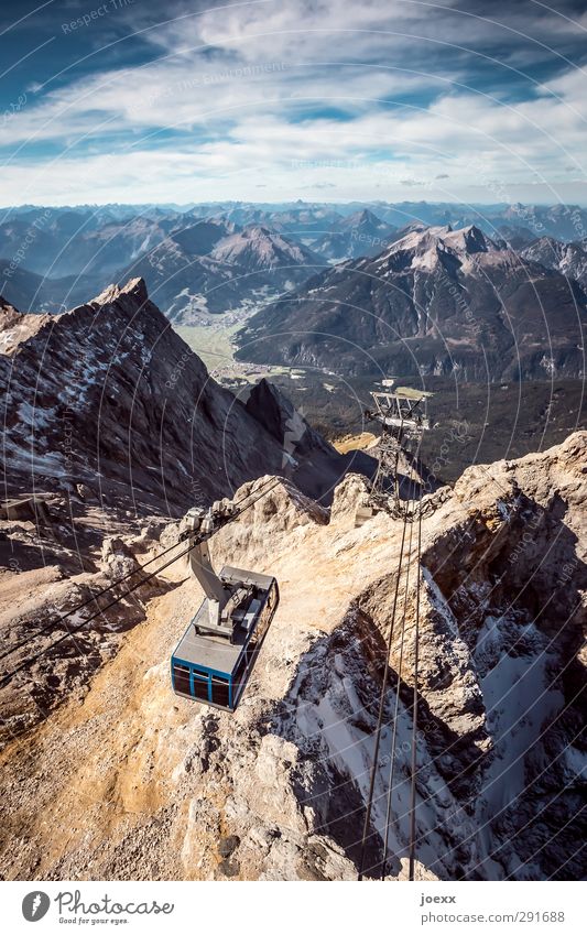 descent Landscape Sky Clouds Horizon Summer Beautiful weather Rock Alps Mountain Zugspitze Means of transport Cable car Stone Movement Driving Gigantic Infinity