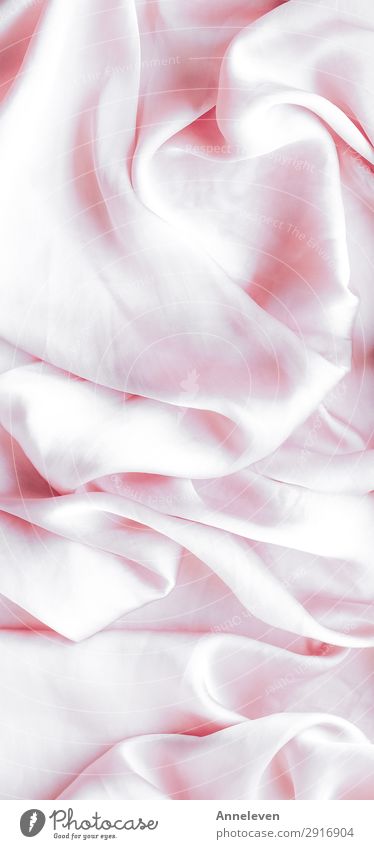Beautiful elegant wavy light pink satin silk luxury cloth fabric texture,  abstract background design. Stock Photo