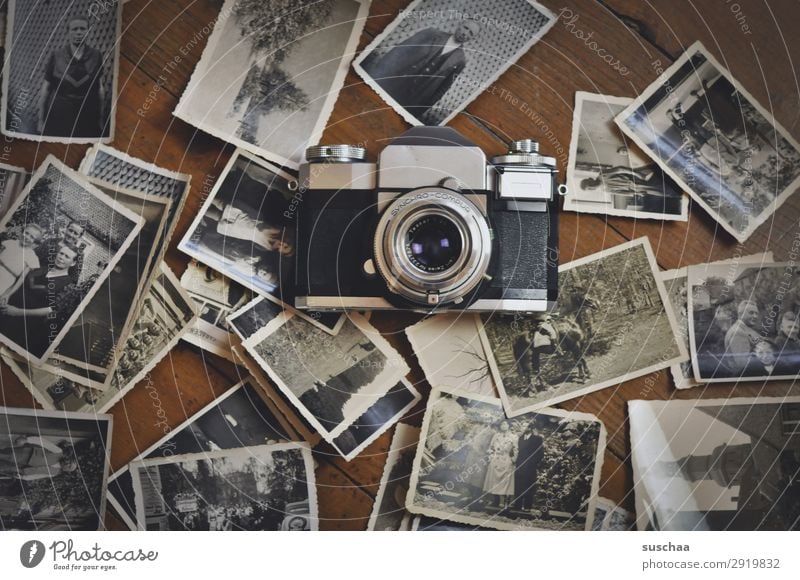 old photos and a camera Photography Negative Old Black & white photo Take a photo Analog Memory Nostalgia Grief family album Past Transience Infancy