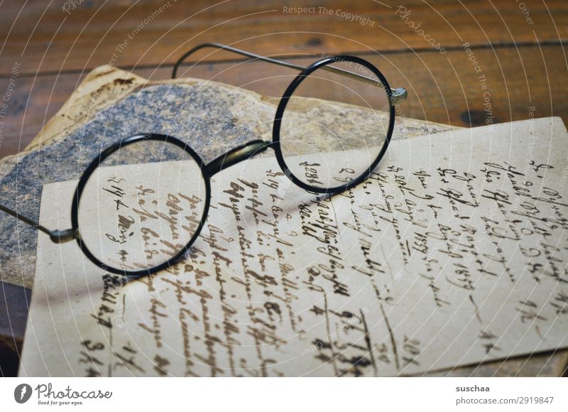 old handwritten document with glasses and old book Old Retro Vintage Letter (Mail) Write Text Paper Antique Handwriting Communication transient abatement