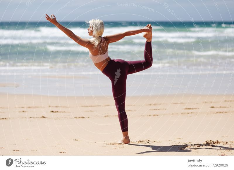 Girl doing yoga on the beach Stock Photo by ©vadimphoto1@gmail.com 115409776