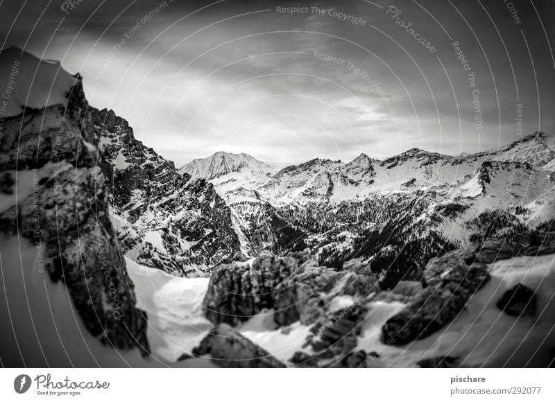 Salzburg region Landscape Clouds Winter Snow Mountain Snowcapped peak Dark Sharp-edged Adventure Black & white photo Exterior shot Day Contrast Blur