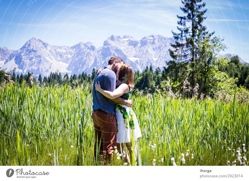 happy lovers on Holiday in the alps mountains Lifestyle Happy Beautiful Relaxation Vacation & Travel Adventure Summer Mountain Woman Adults Man Couple Partner