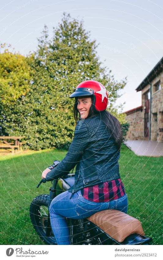 Woman with helmet riding custom motorbike Lifestyle Happy Beautiful House (Residential Structure) Engines Human being Adults Tree Grass Transport Vehicle