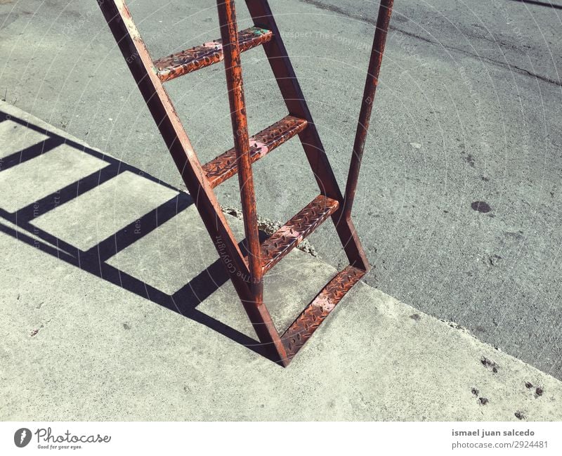 old metallic ladder in the street shadow silhouette Stairs Ladder Old Wall (building) Street Exterior shot Building Objective Metal staircase Stepladder Tool