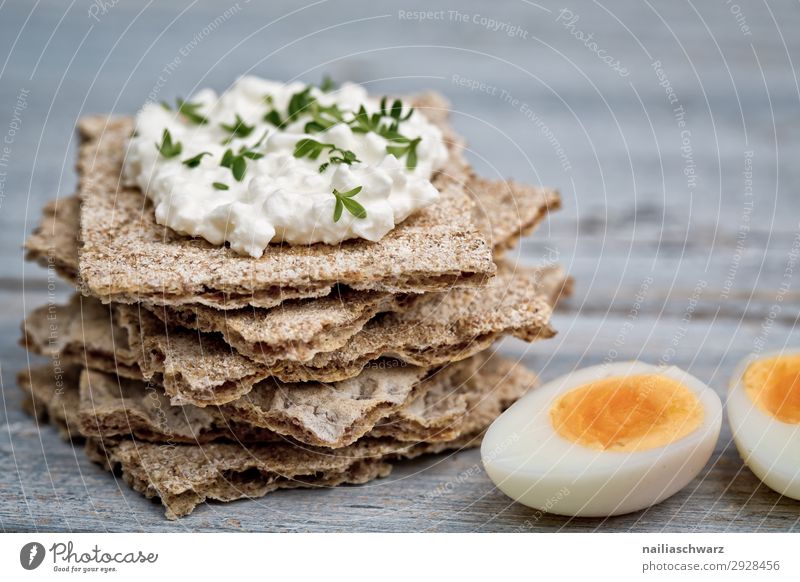 Crispbread with Cottage Cheese crispbread hardbread cottage cheese fresh cheese radish red brown white vegetable vegetarian quail egg Flash photo Studio shot