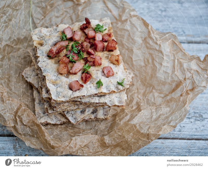 Crispbread with Bacon Bits crispbread bacon bacon bits diced hardbread fried rustic fresh bread brown white cress garden cress Flash photo Studio shot