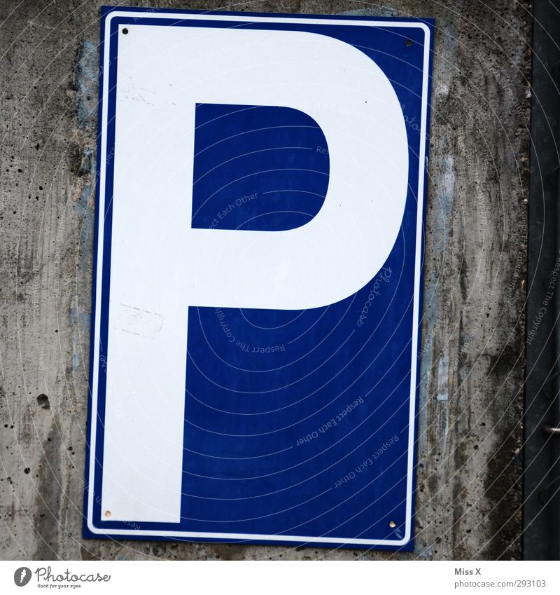 P Characters Signs and labeling Signage Warning sign Road sign Blue Parking lot Colour photo Exterior shot Close-up