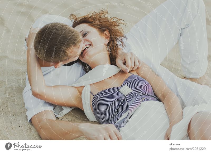 happy loving couple lying on the beach Lifestyle Leisure and hobbies Playing Vacation & Travel Tourism Trip Party Event Feasts & Celebrations Valentine's Day