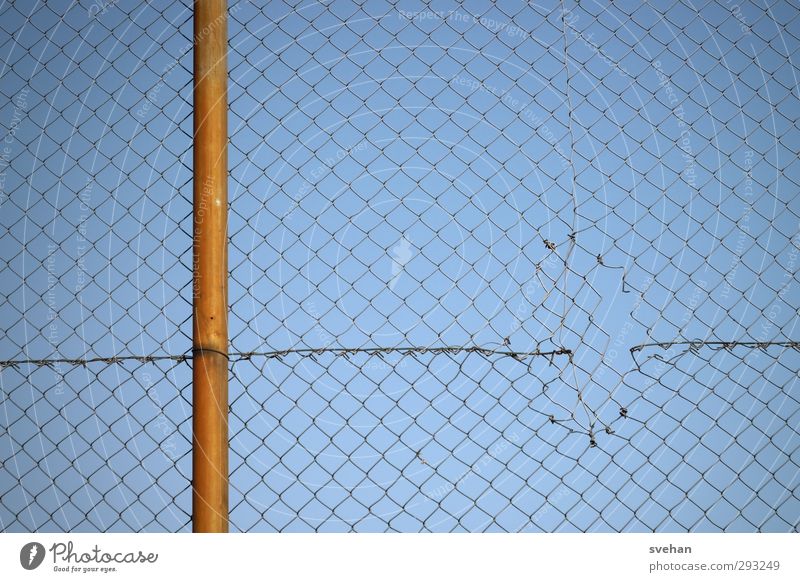 Wires and straws Net Fence - a Royalty Free Stock Photo from Photocase