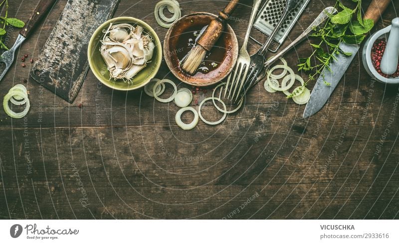 Kitchen utensils on rustic wooden background with fresh seasoning, BBQ simple marinade, top view. Copy space. kitchen bbq copy space barbecue steakhouse