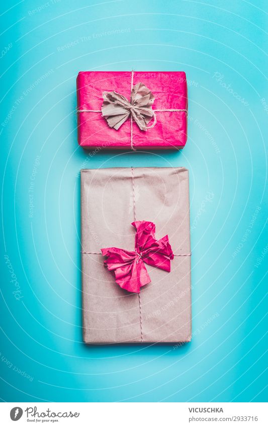 Gift boxes on blue background Shopping Design Joy Valentine's Day Mother's Day Birthday Decoration Bow Love Blue Pink Turquoise Background picture flat lay