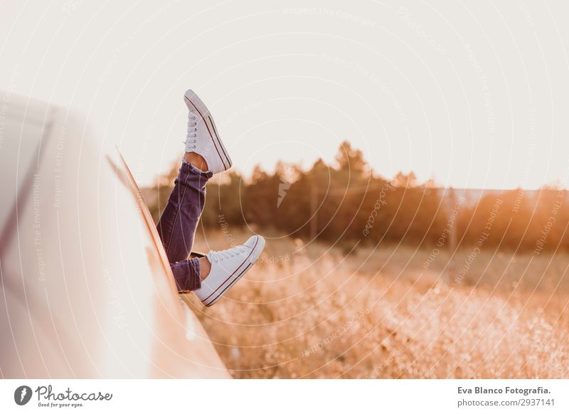 Modern hipster girl resting in a car and admiring view Lifestyle Joy Relaxation Vacation & Travel Trip Adventure Summer Sun Feminine Young woman