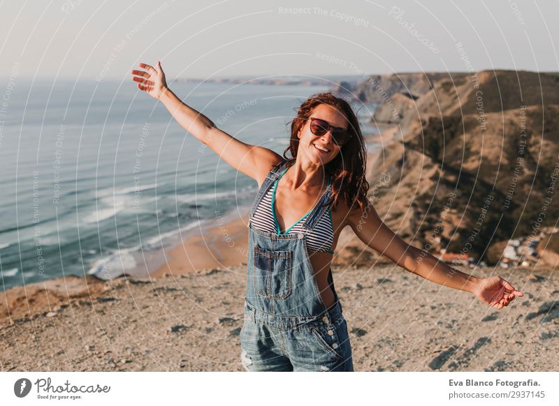portrait of beautiful happy young woman outdoors Lifestyle Happy Beautiful Vacation & Travel Tourism Adventure Freedom Summer Sun Beach Ocean Mountain Success