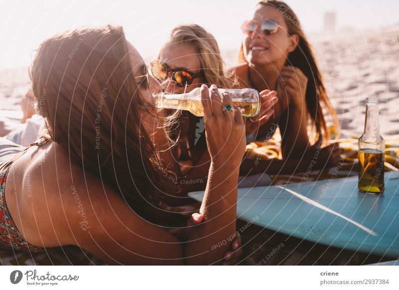 group of friends drinking beer on beach in summer Drinking Alcoholic drinks Beer Bottle Joy Happy Relaxation Vacation & Travel Summer Sun Beach Friendship
