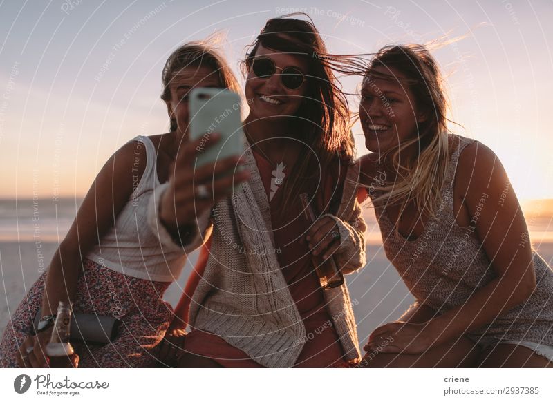 Group of friends taking selfie with phone on beach party Lifestyle Joy Happy Vacation & Travel Summer Telephone Technology Friendship Sunglasses To enjoy