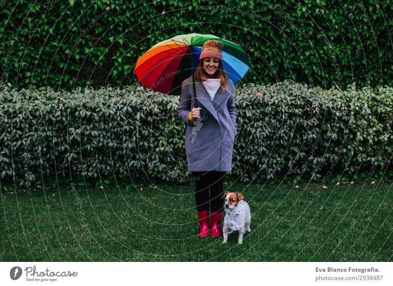 young woman and dog with umbrella outdoors Lifestyle Human being Feminine Young woman Youth (Young adults) Woman Adults 1 30 - 45 years Nature Water