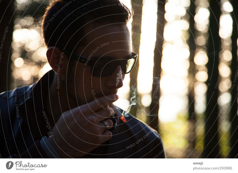 glow Masculine Young man Youth (Young adults) 1 Human being 18 - 30 years Adults Sunglasses Cool (slang) Smoking Cigarette Exterior shot Evening Silhouette