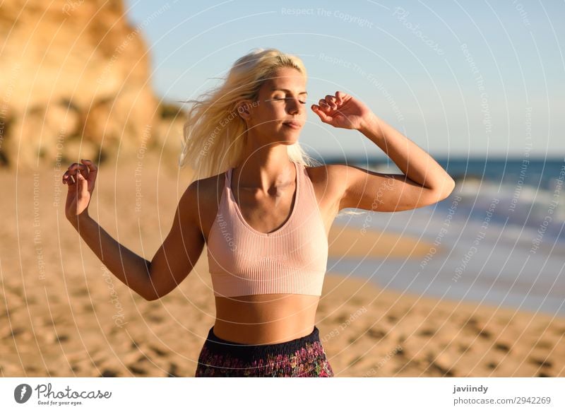 Woman enjoying the sunset on a beautiful beach Lifestyle Happy Beautiful Body Relaxation Leisure and hobbies Vacation & Travel Freedom Summer Sun Beach Ocean