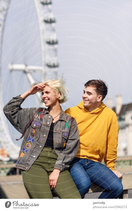 Happy couple by westminster bridge, River Thames, London. UK. Lifestyle Joy Beautiful Vacation & Travel Tourism Sightseeing Human being Masculine Feminine