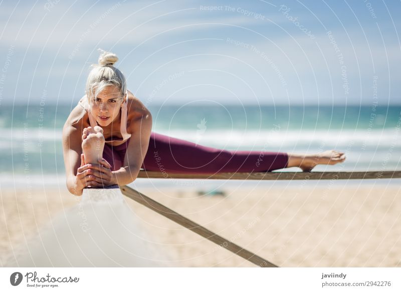 Girl doing yoga on the beach Stock Photo by ©vadimphoto1@gmail.com