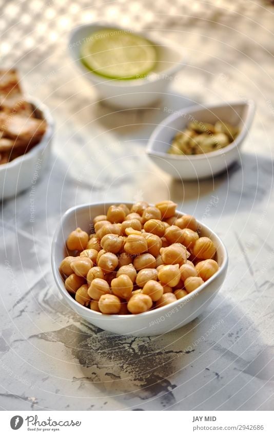 Chickpeas cooked in white bow on the table ready Food Meat Vegetable Herbs and spices Nutrition Eating Lunch Dinner Organic produce Vegetarian diet Diet Bowl