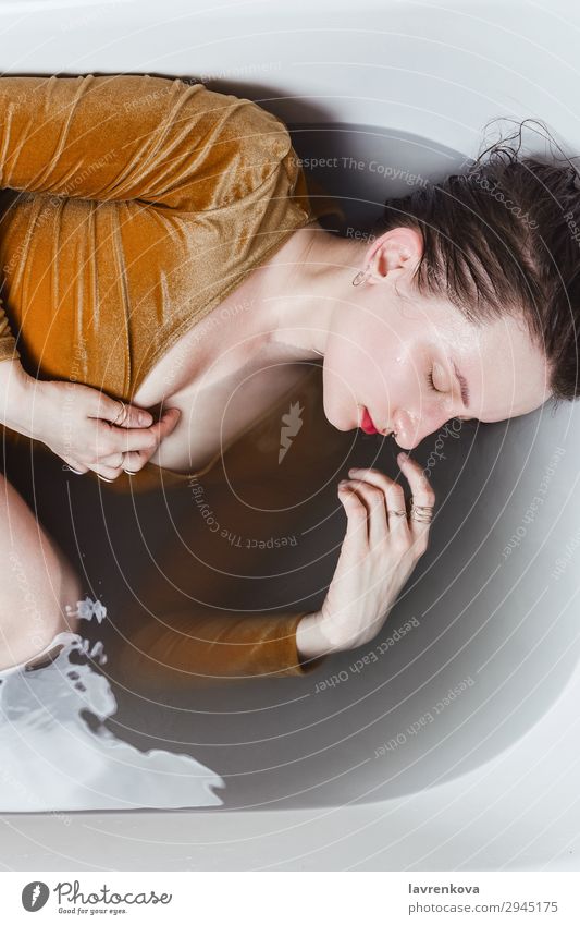 Woman lying in bathtub filled with charcoal water Swimming & Bathing Bathroom Bathtub Beauty Photography Body Bomb Personal hygiene Caucasian Charcoal Detox