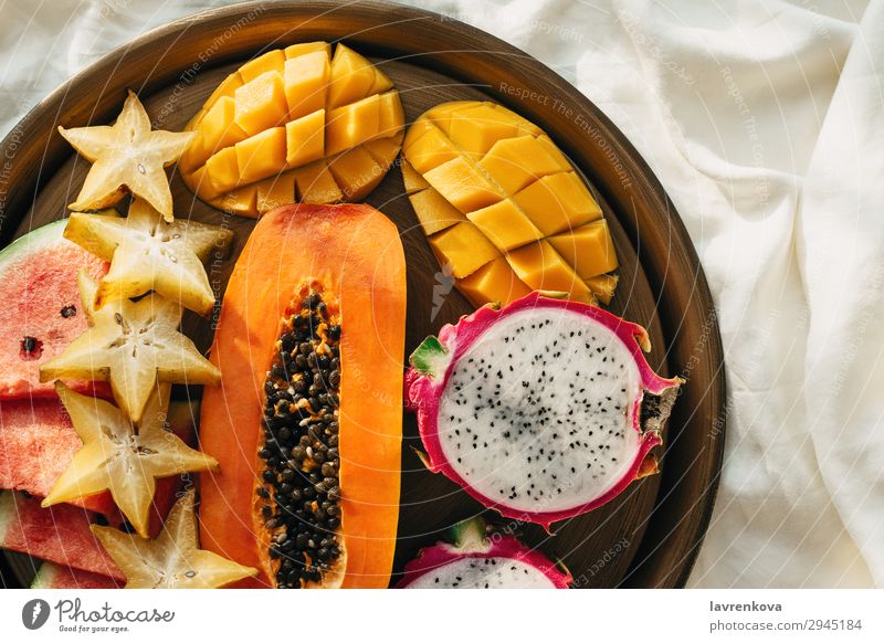 Various exotic tropical fruits on a metal tray in bed Bedroom Breakfast Carambole Cut Delicious Dessert Diet Dragonfruit Exotic flat flatlay Food Healthy Eating