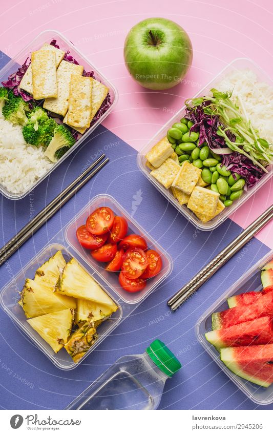 Two healthy asian-style vegan lunch bento boxes Bottle knolling Apple flatlay Asian Food Asian rice dish Broccoli Tomato Container Delicious Diet Dinner Dish